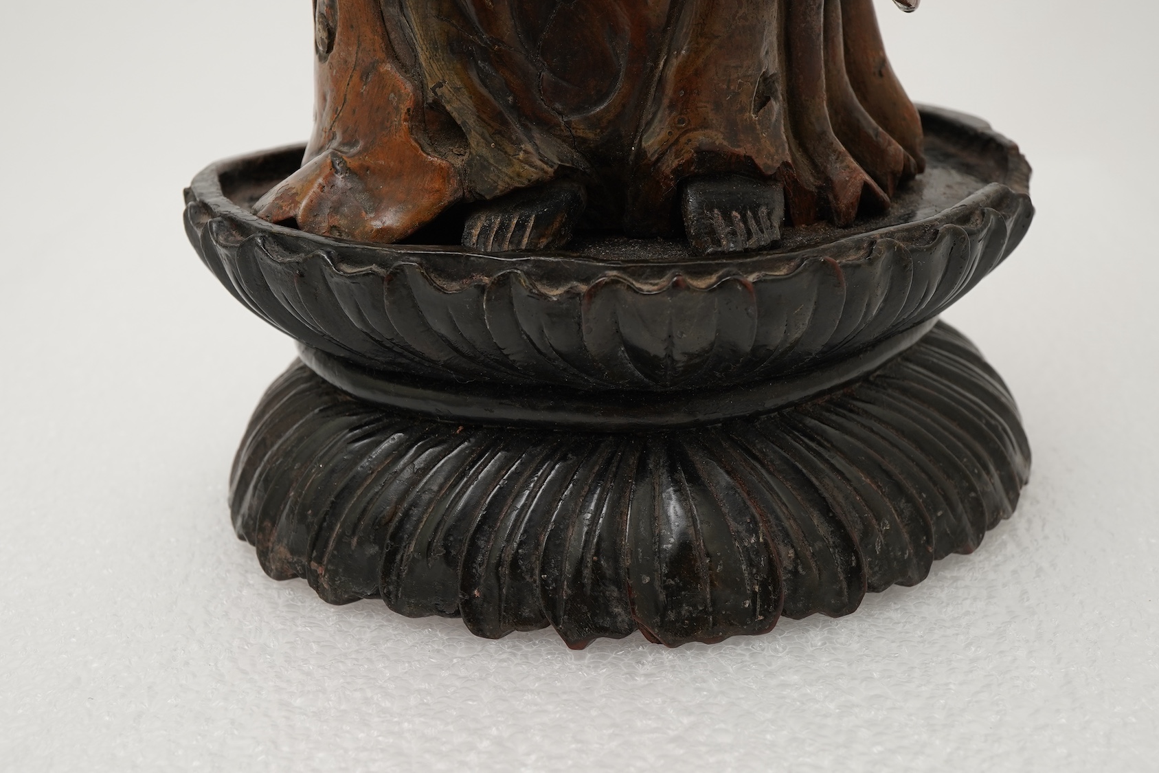 A Chinese rootwood standing figure of Guanyin, 18th/19th century